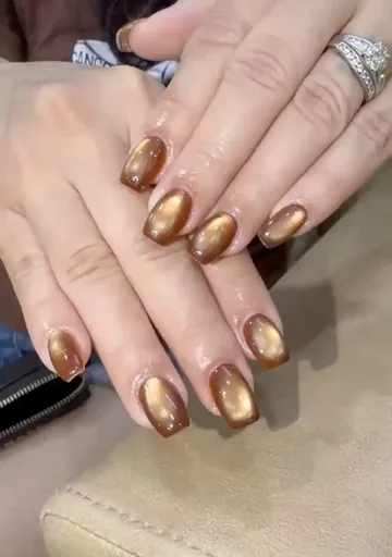 Cooling ocean wave chrome nails for hot coastal weather