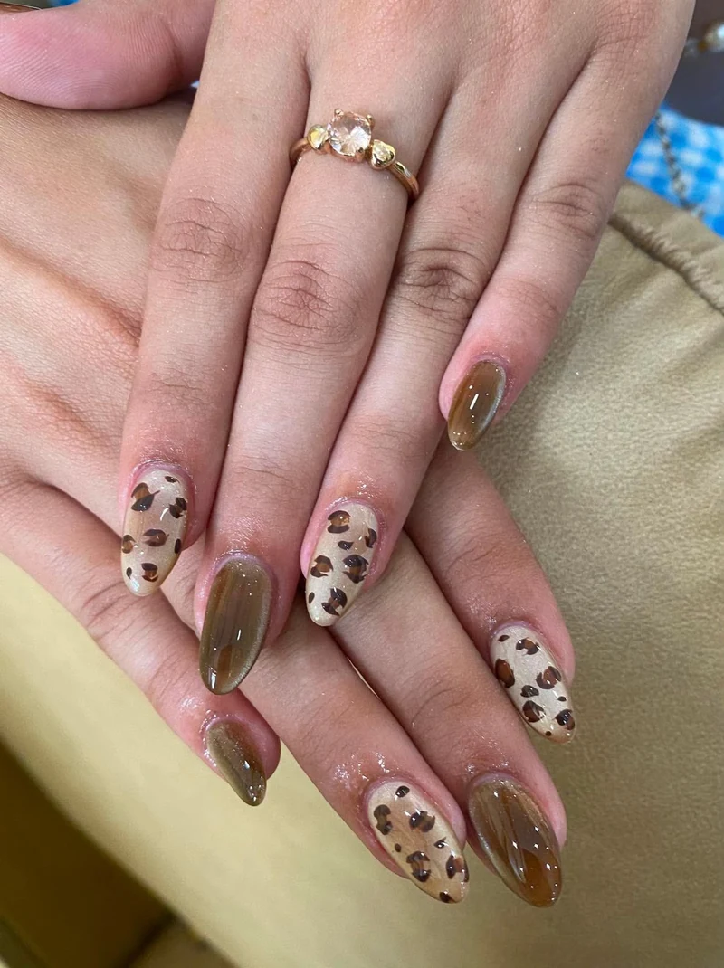 Olive and animal-print nail art