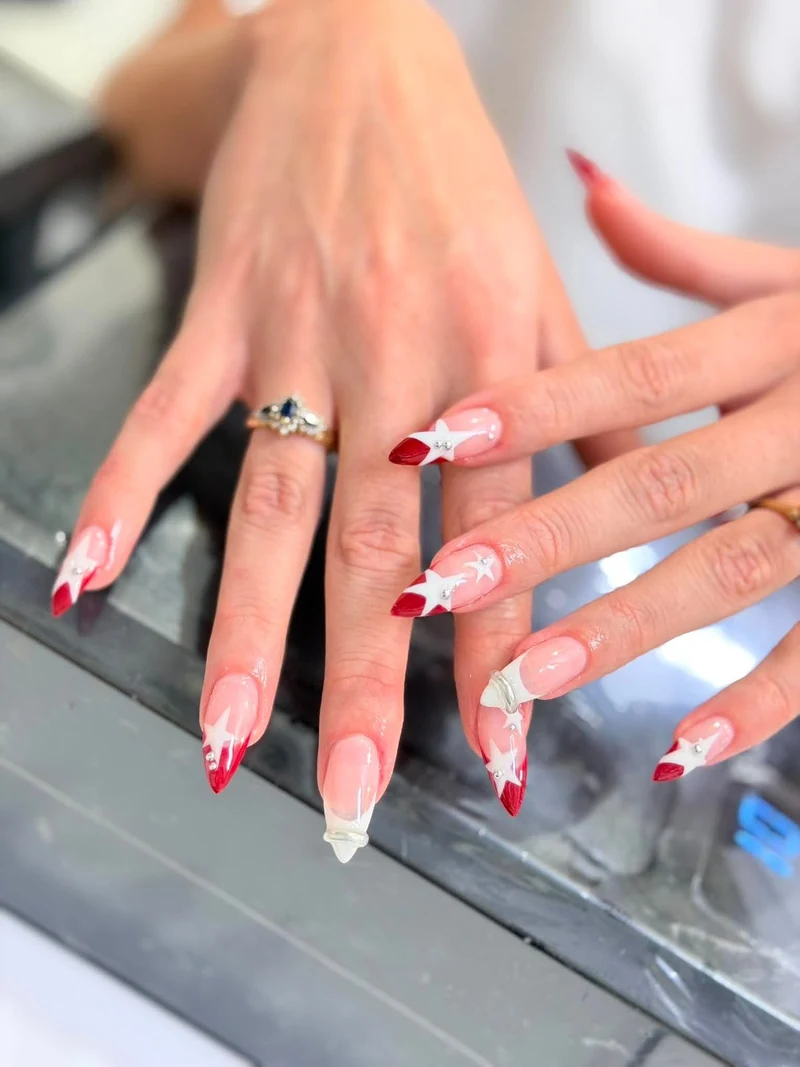 Pink and red French nails with bows